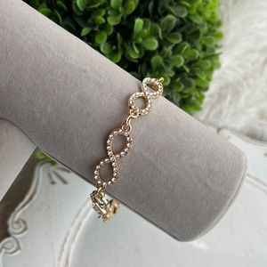 Custom designed fashion gold tone embellished infinity bracelet NWOT